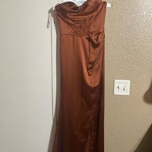 Beautiful dress used it once as a bridesmaid. It has been dry cleaned